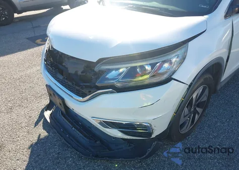 2016 Honda Cr-V Touring z USA, uszkodzony, nr VIN 5J6RM3H91GL016095